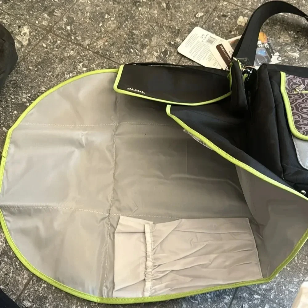 JJ Cole black/lime/gray pattern multi compartment adjustable strap diaper bag